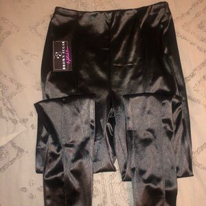 Black, fake leather pants. Never worn.